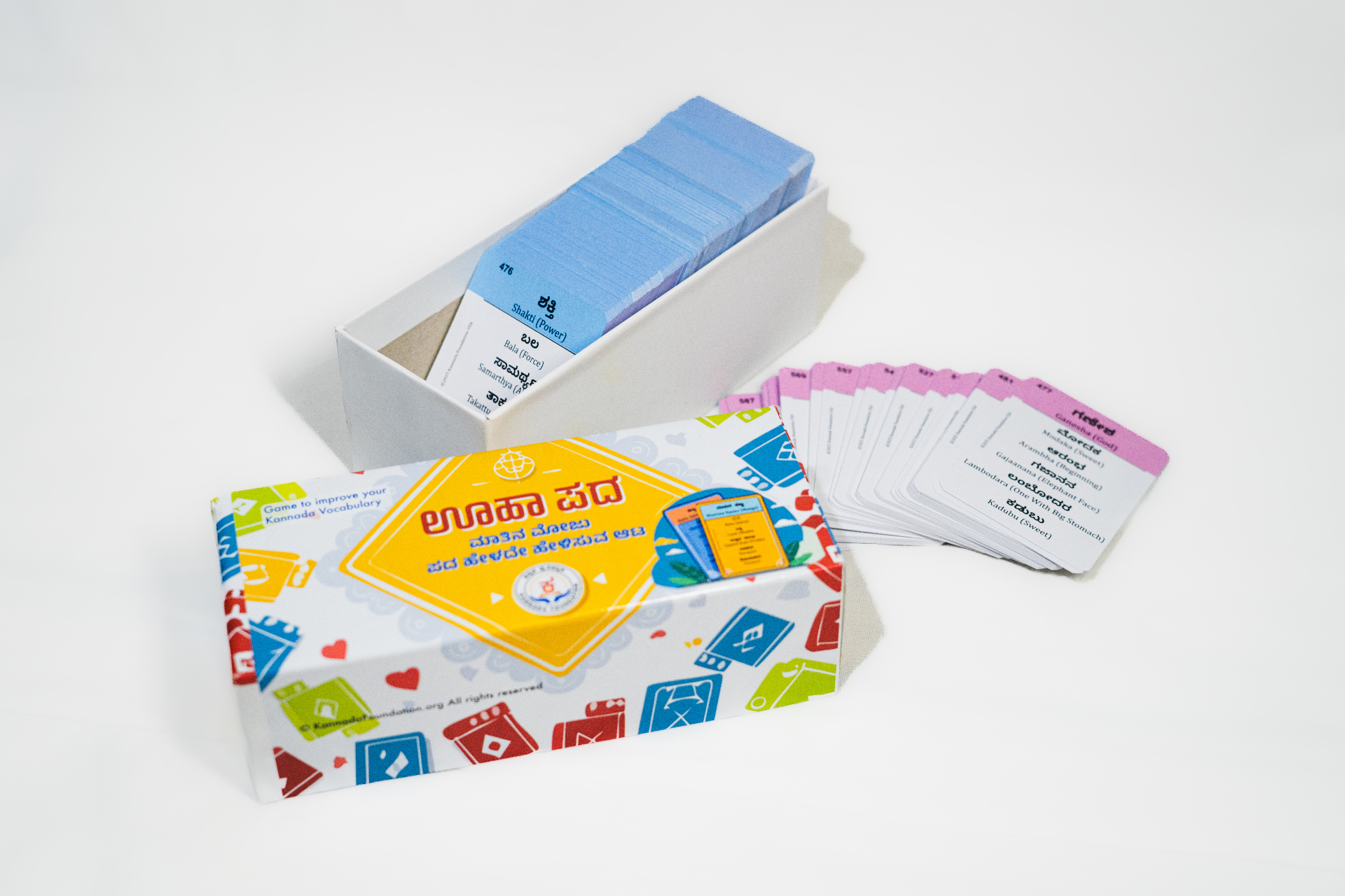 Open Ooha Pada box with fanned cards